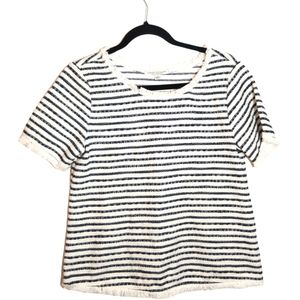 Green Envelope Los Angeles.  Navy and white striped blouse with fringed detail